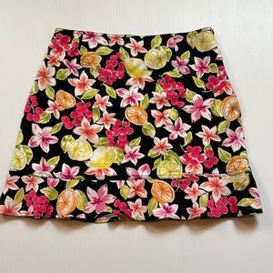 Briggs black, yellow, green, orange & pink, flower & fruit short skirt. Size 12P